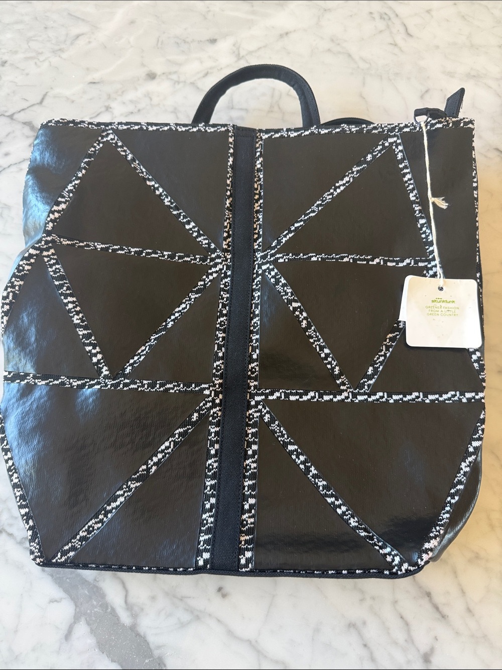 Skunkfunk canvas vinyl and knit backpack NWT black and white. 15x-14”